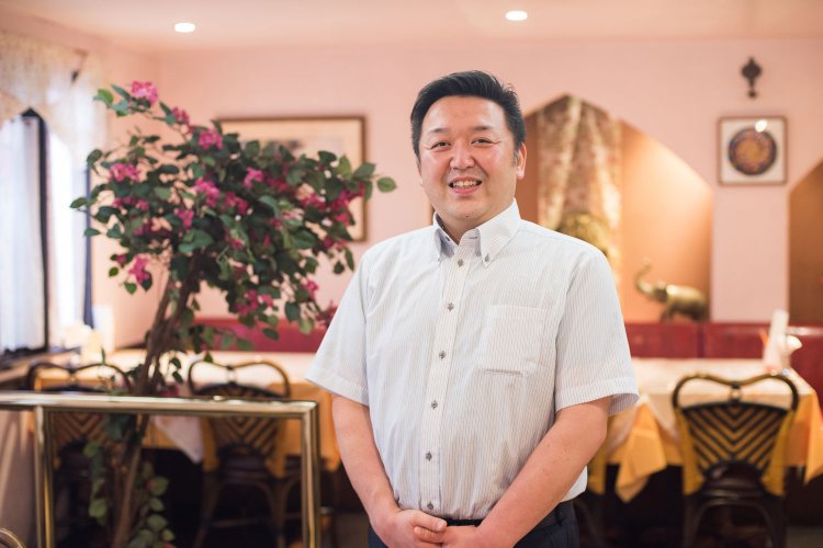「市内で本場インド料理を食べられるのは当店だけだと思います。多くの方に味わっていただきたいです」と話す店長の田中範さん。