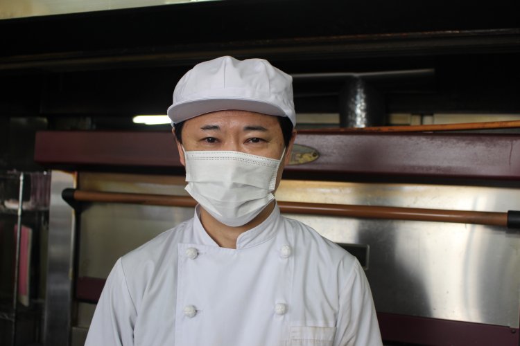 丸十の3代目。サラリーマンを経て店に入った。