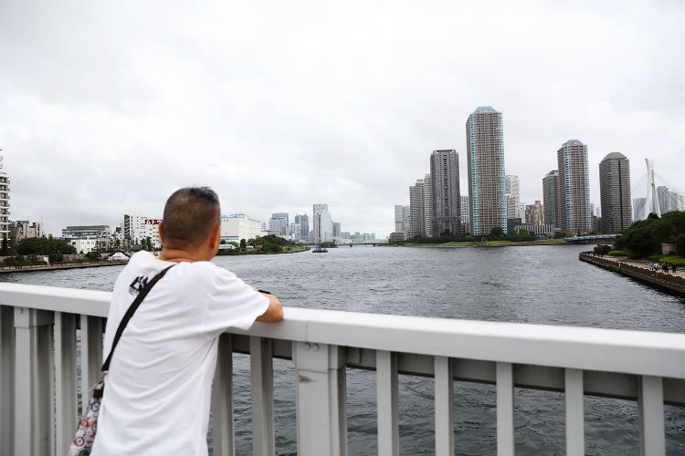 永代橋から隅田川と晴海運河が分かれる風景は「マンハッタンに似てるんだよ」。