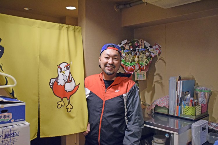 店主の藤井世紀さん。