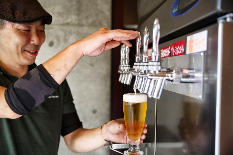 店長の門伝さん。