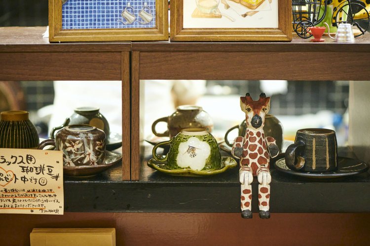 随所に潜むキリンは客からの贈り物。
