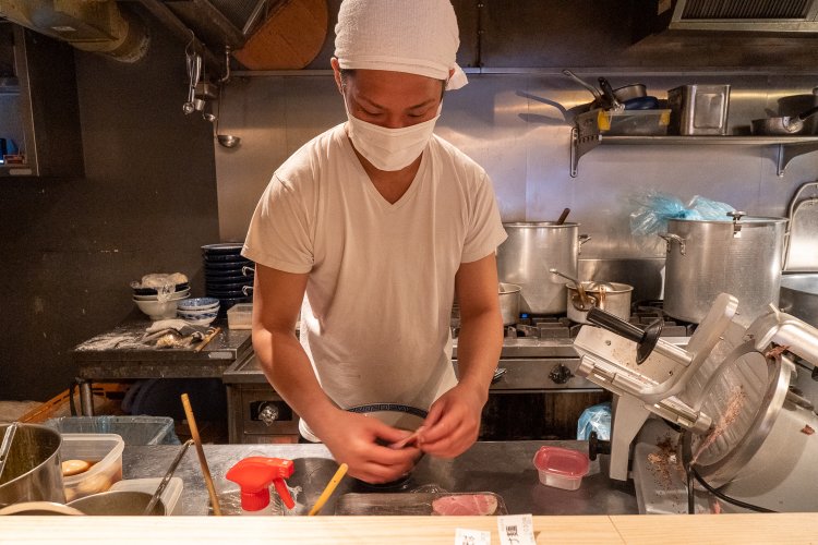 店長の吉田司さん。つけ麺が好物とのこと。