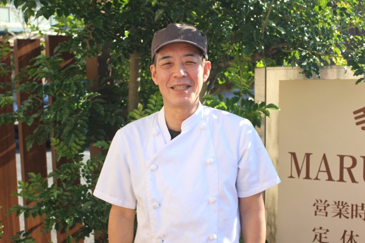 店主の田久保敏正さん。