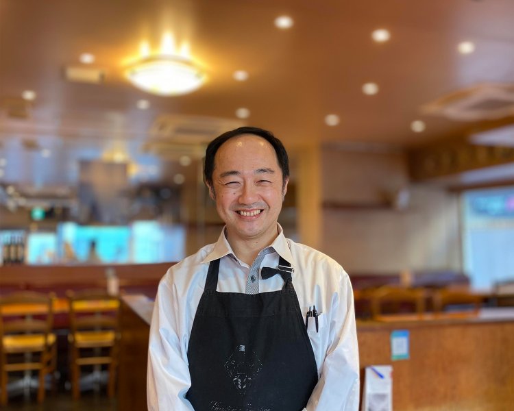 支配人の有田貴洋さん。イタリアに造詣が深い。