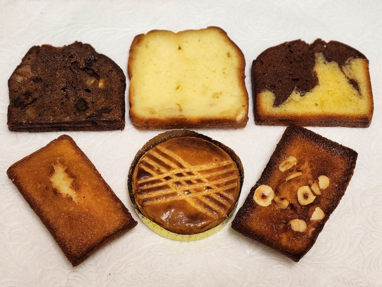 写真上段 パウンドケーキ（左からショコラ、シトロン、マーブル）各238円。写真下段 左からフィナンシェナチュールー320円、サブレブルトン227円、フィナンシェブールサレ320円。