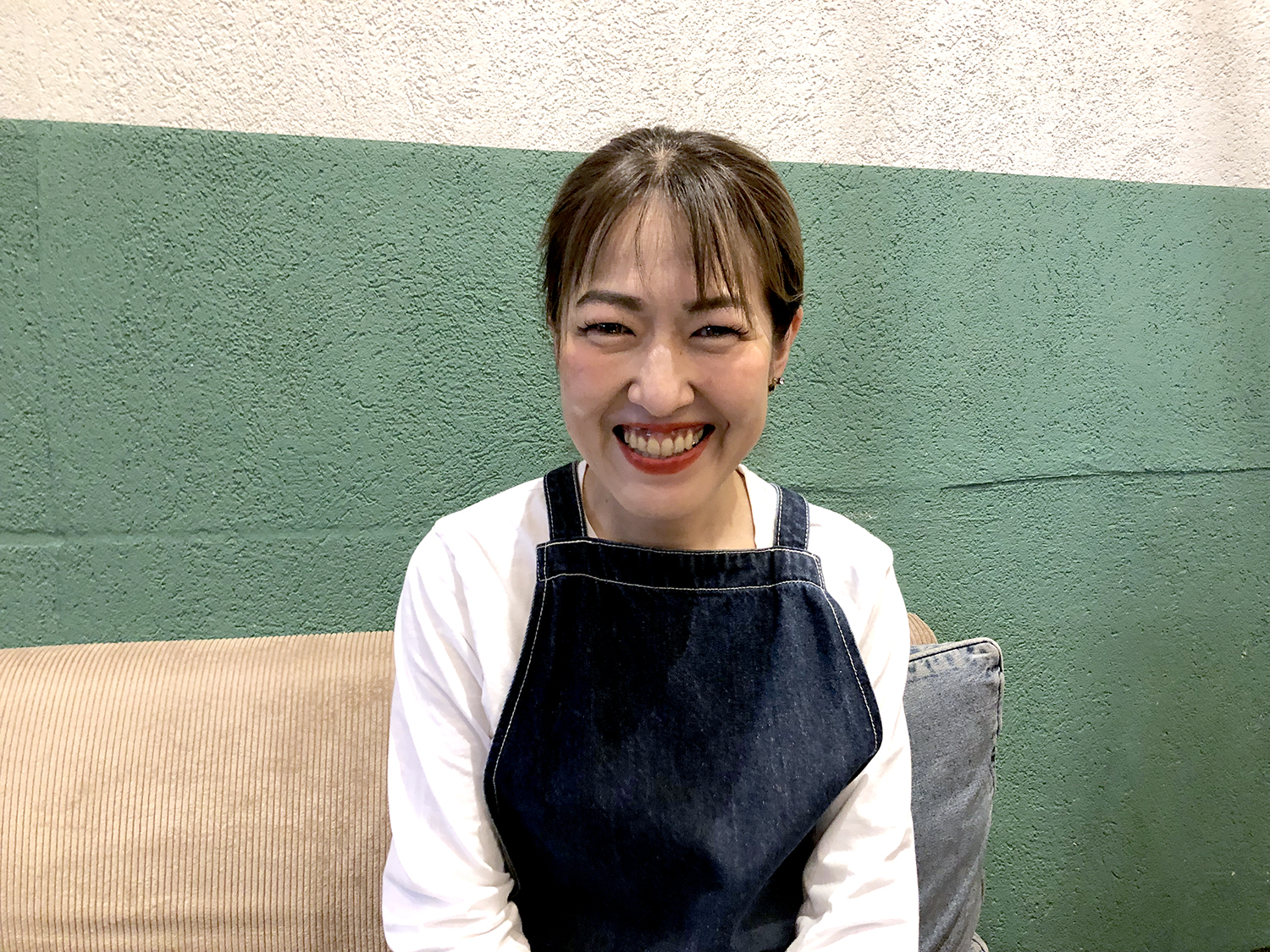 笑顔が素敵な店長の根津裕子さん。