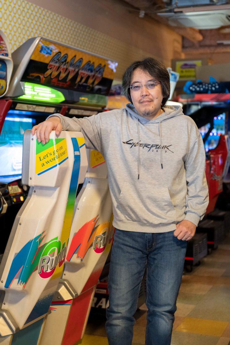 「ゲーセンには他にないライブ感があるんです」と経営者兼店長の池田稔さん。ギタリストとしても知られている。