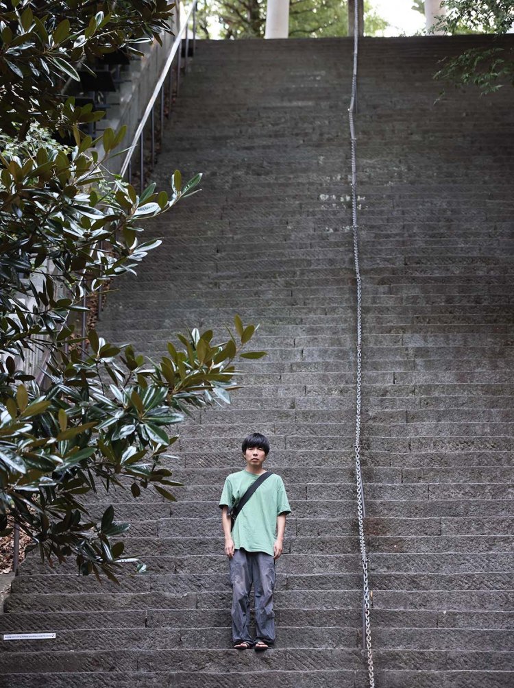 吉田の実家の神社ではなく、東京都港区にある愛宕神社「出世の石段」で撮影。