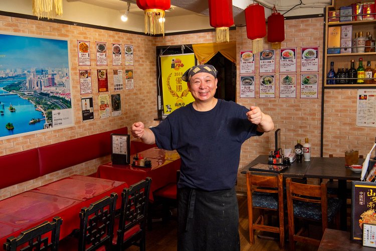 仏教の聖地でもある五台山近郊出身の李さん。店では料理教室も開催している。