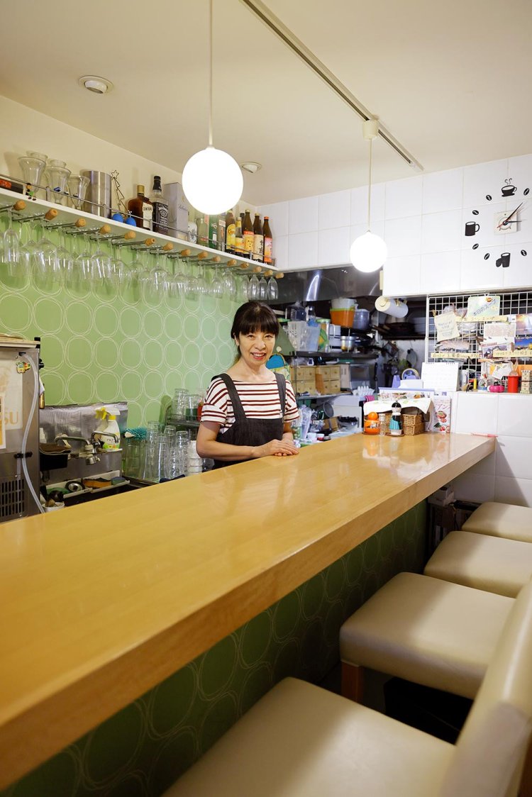 妻の丸野典子さん。