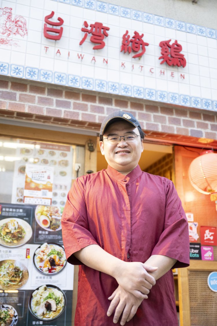 店主のキョ・イシさん。