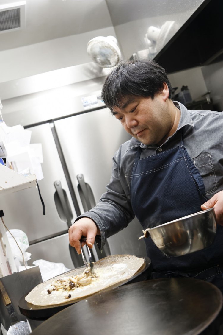 IT業界から転身した店主の中田大作さん。