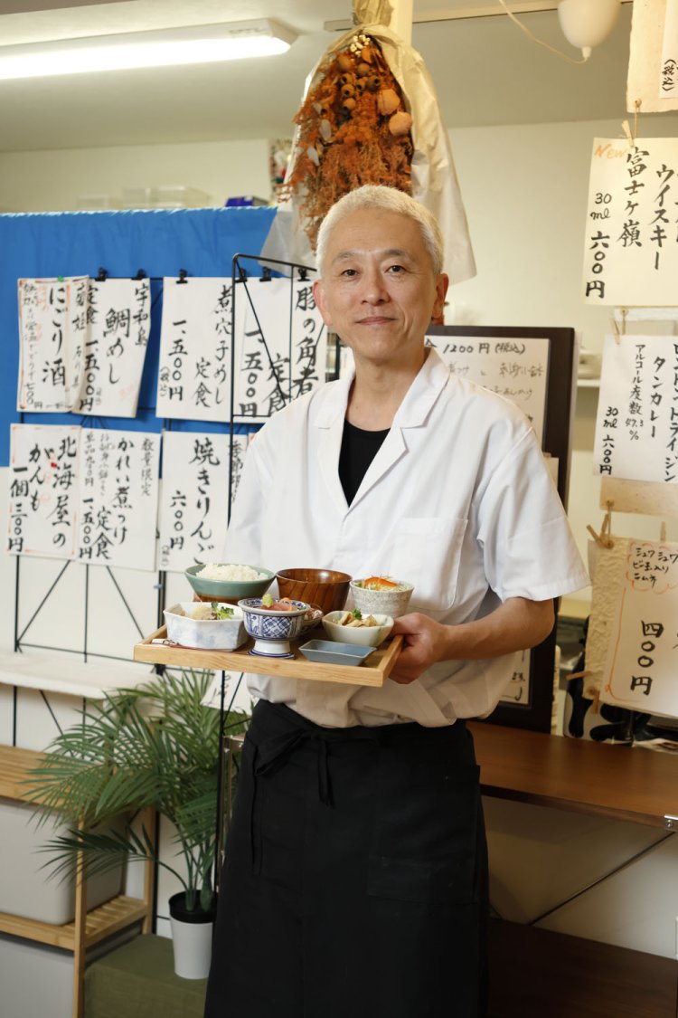 店主の金井雄一さん。