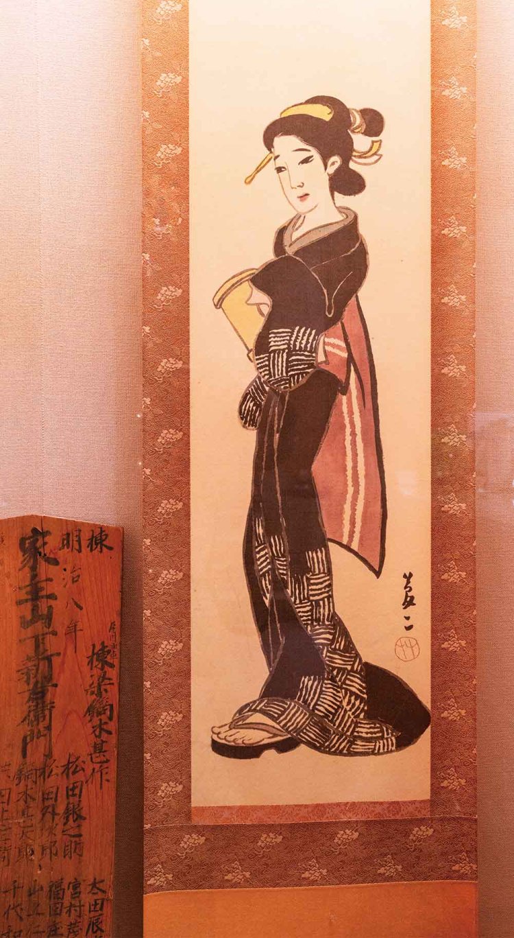 フロント横には、彦乃をモデルに描いた『湯上がり美人』のレプリカが飾られている。