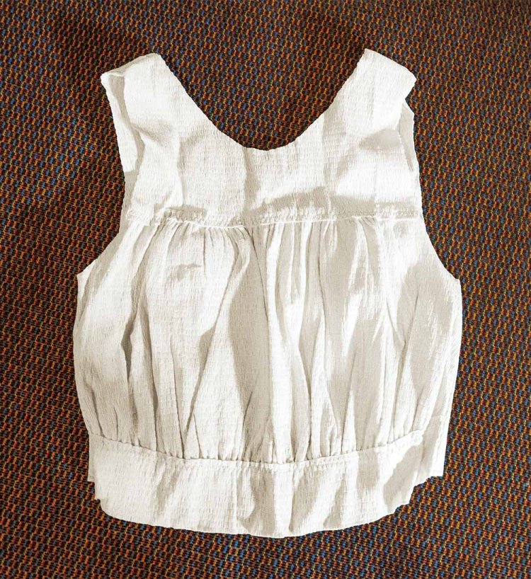 傷痕を気にせず入れる湯浴み着500円。