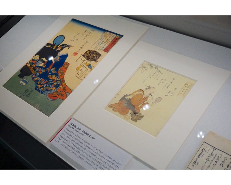 遊女の監督役を務める「やり手」の女性が歯を黒く染めているシーン。