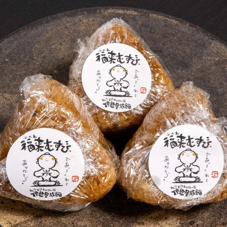 福来むすび1個180円。2個入りで総菜付きの弁当は600円～。2日前までに予約を。