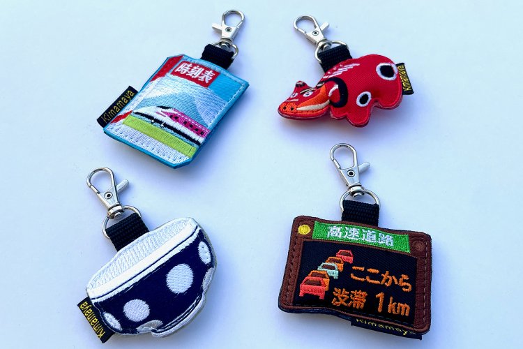 左上から時計回りに「時刻表」「赤べこ」「高速渋滞」「旅館の湯呑み」。